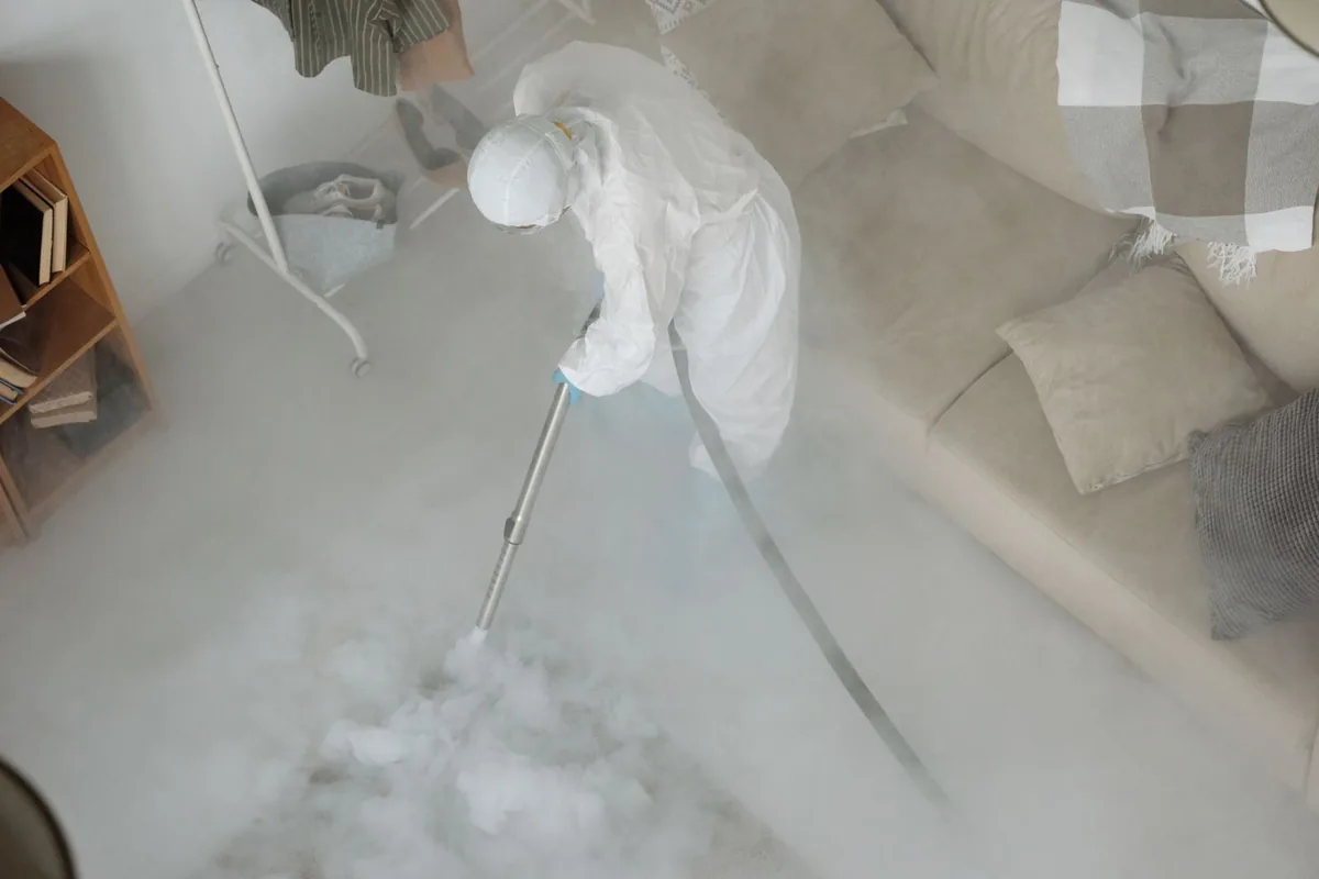Biohazard cleanup technician in protective equipment, Clayton, OH